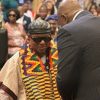 President Nana Addo handing citizen form to Stevie Wonder